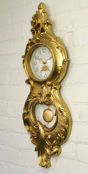 Vintage Figural Gold Pendulum Battery Wall Clock | eXibit collection